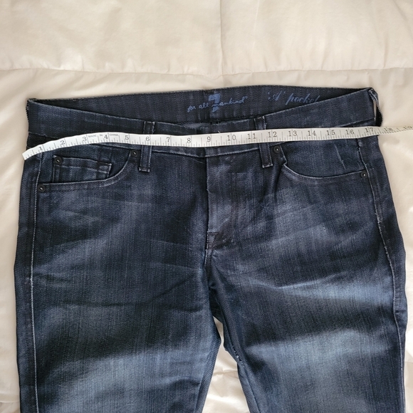 7 FOR ALL MANKIND // A pocket distressed mid-rise boot-cut stretch denim jeans - Picture 9 of 12